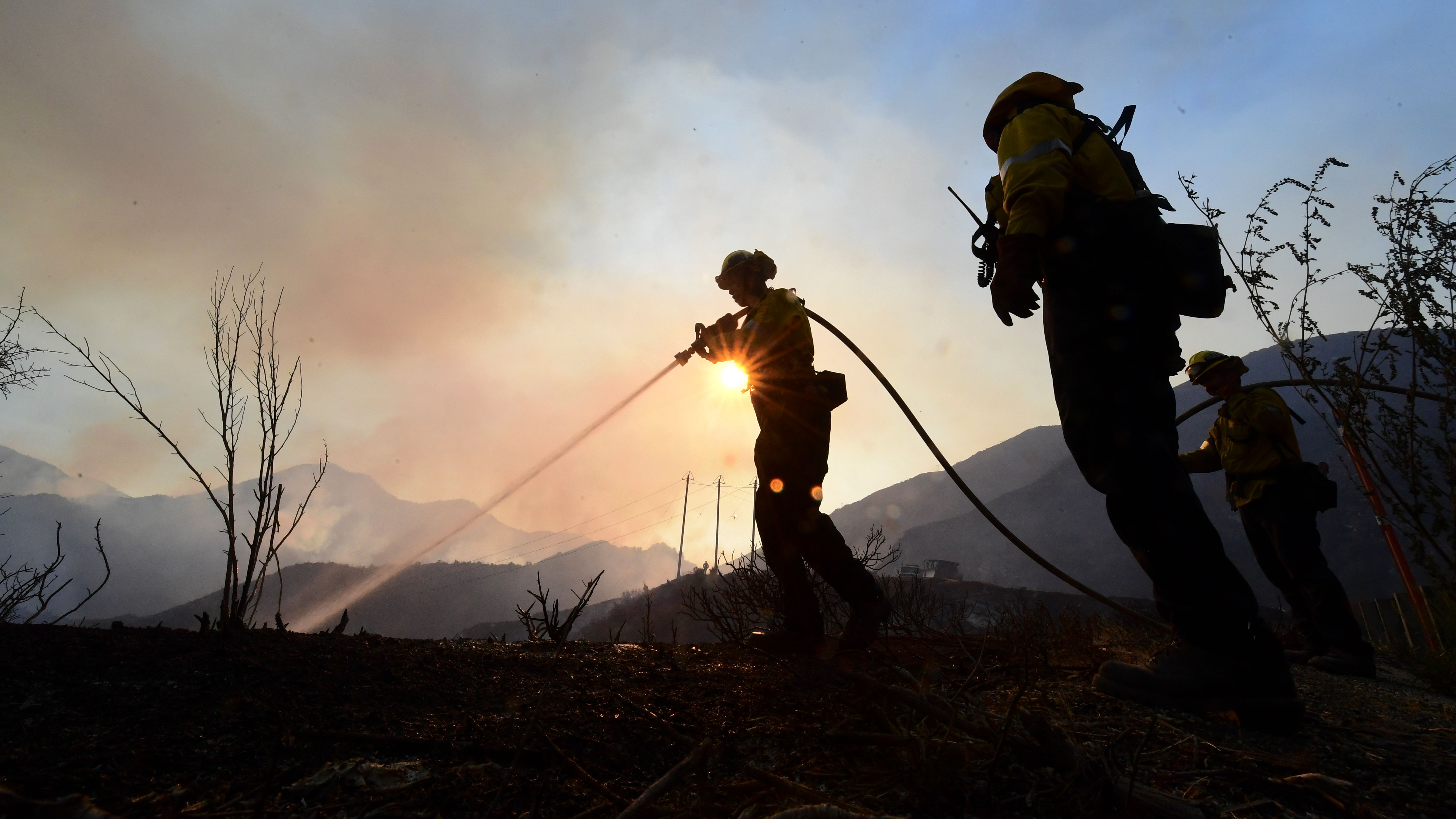 Firefighters work the Bobcat Fire in the Angeles National Forest on Sept. 23, 2020, in Los Angeles. (FREDERIC J. BROWN/AFP via Getty Images)