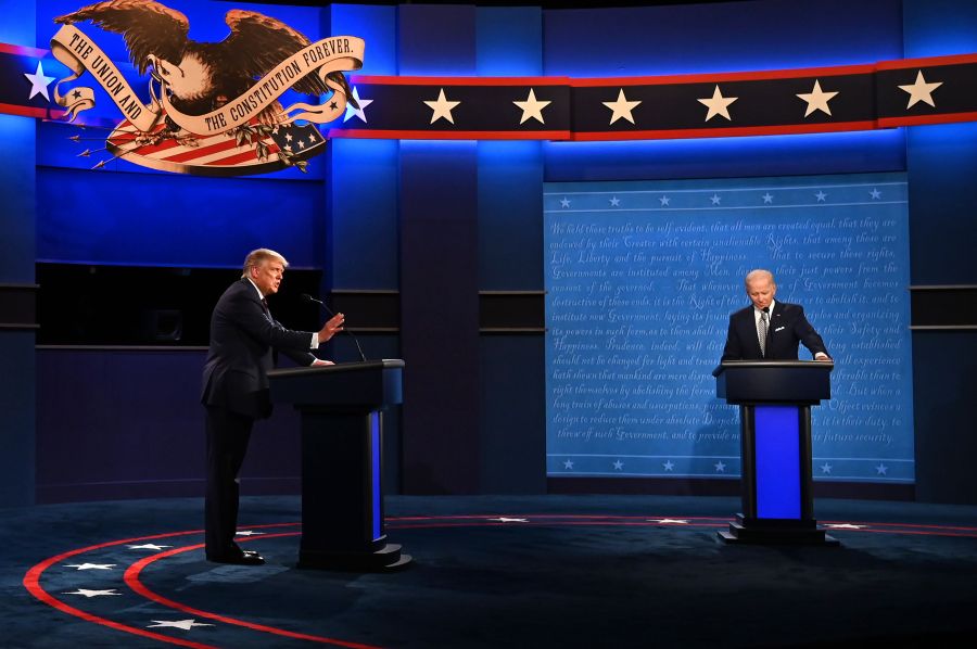 President Donald Trump and former Vice President Joe Biden exchange arguments during the first presidential debate at the Case Western Reserve University and Cleveland Clinic in Cleveland, Ohio on Sept. 29, 2020. (JIM WATSON/AFP via Getty Images)