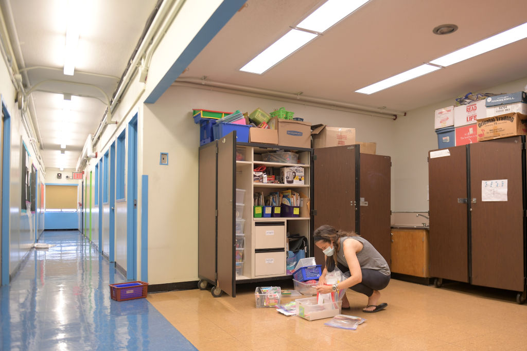 Teacher Marisa Wiezel, who is related to the photographer, prepares for the 2020/2021 school year at Yung Wing School P.S. 124 on Aug. 25, 2020 in New York City. (Michael Loccisano/Getty Images)