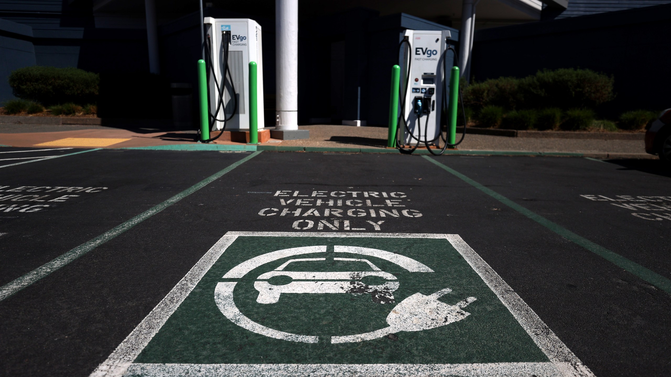 An electric car charges on Sept. 23, 2020, in Corte Madera, California. (Justin Sullivan/Getty Images)