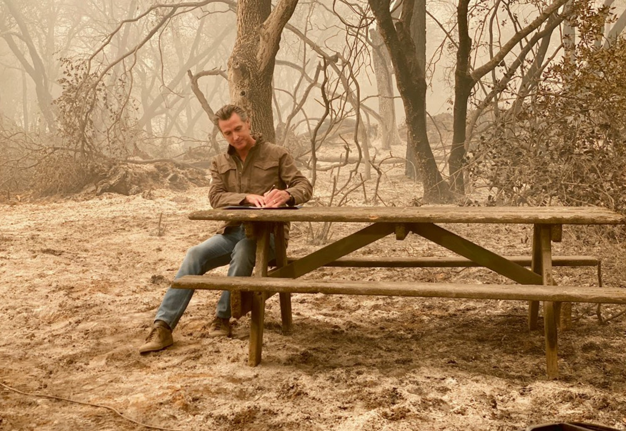 Gov. Gavin Newsom is seen while surveying damage from the North Complex Fire on Sept. 11, 2020.