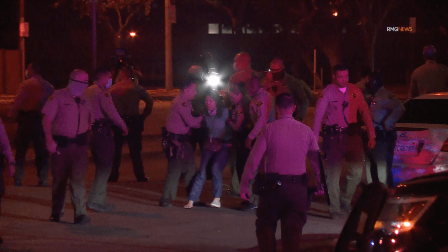 L.A. County deputies arrest radio reporter during protest outside St. Francis Medical Center in Lynwood on Sept. 12, 2020. (RMG News)