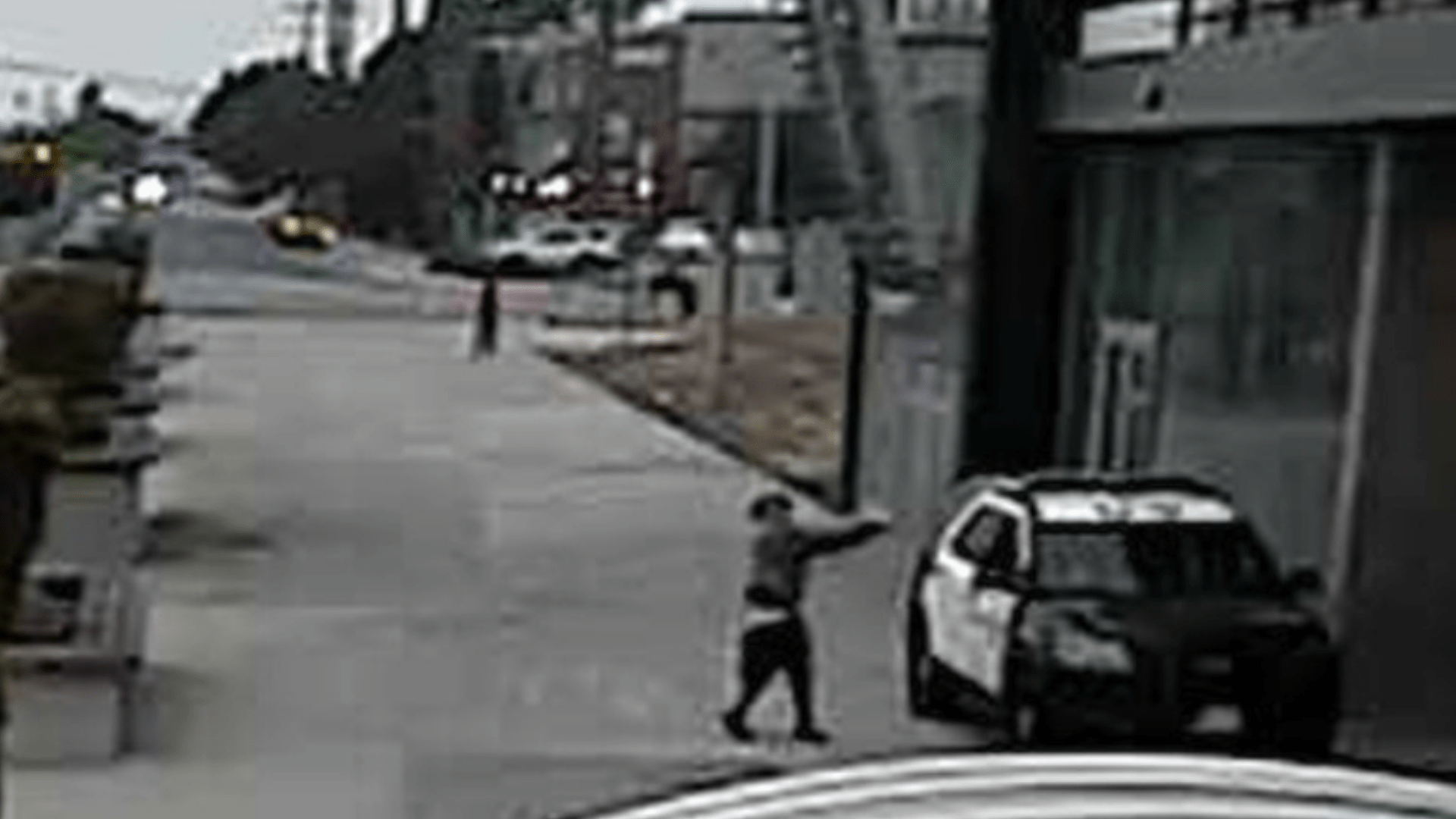 A person appears to fire into a Los Angeles County Sheriff's Department patrol vehicle in a still from footage released by the department on Sept. 12, 2020.