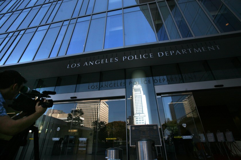 Prosecutors are reviewing the actions of four LAPD officers during recent protests. Above, LAPD headquarters. (Bob Chamberlin / Los Angeles Times)