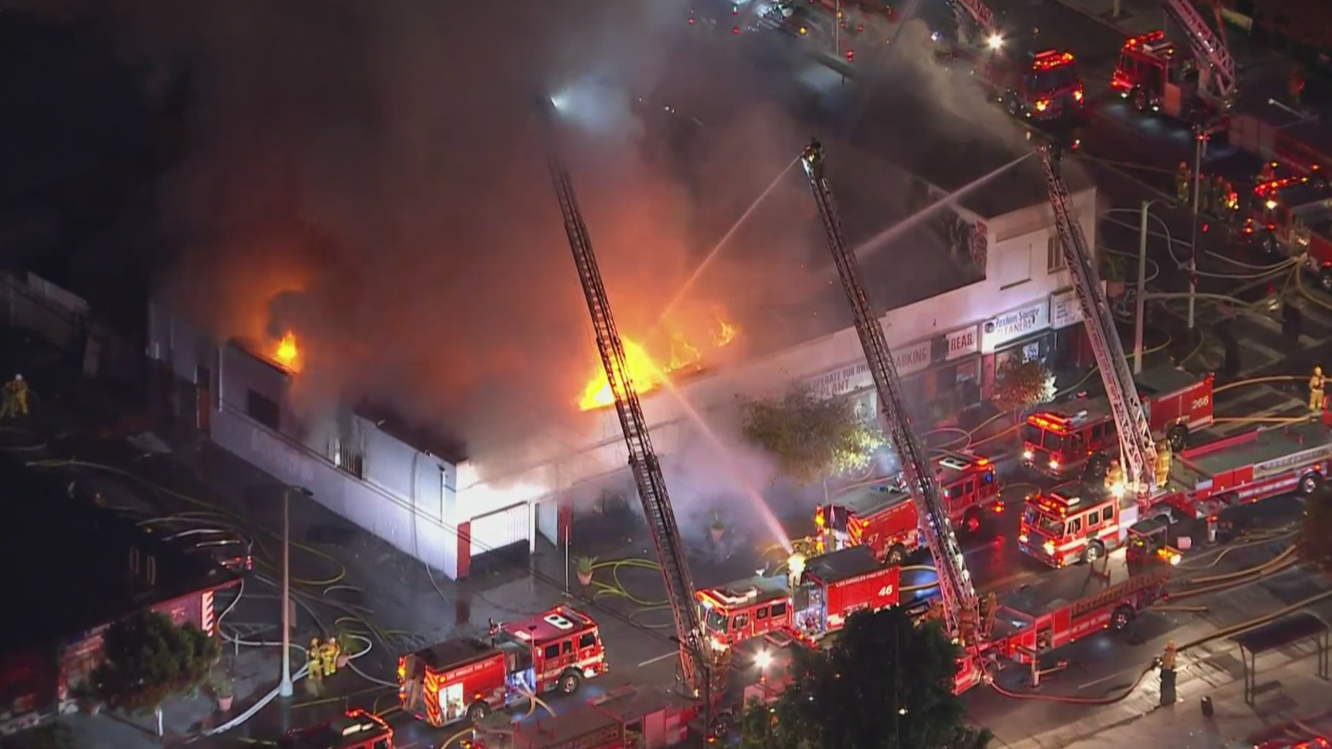 Crews battle a fire at a commercial building in South Los Angeles on Sept. 16, 2020. (KTLA)