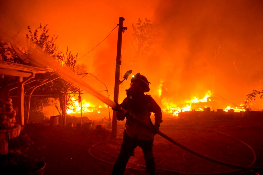 A firefighter works against the Lake Hughes Fire in Angeles National Forest north of Santa Clarita, Calif. (AP Photo/Ringo H.W. Chiu, File)