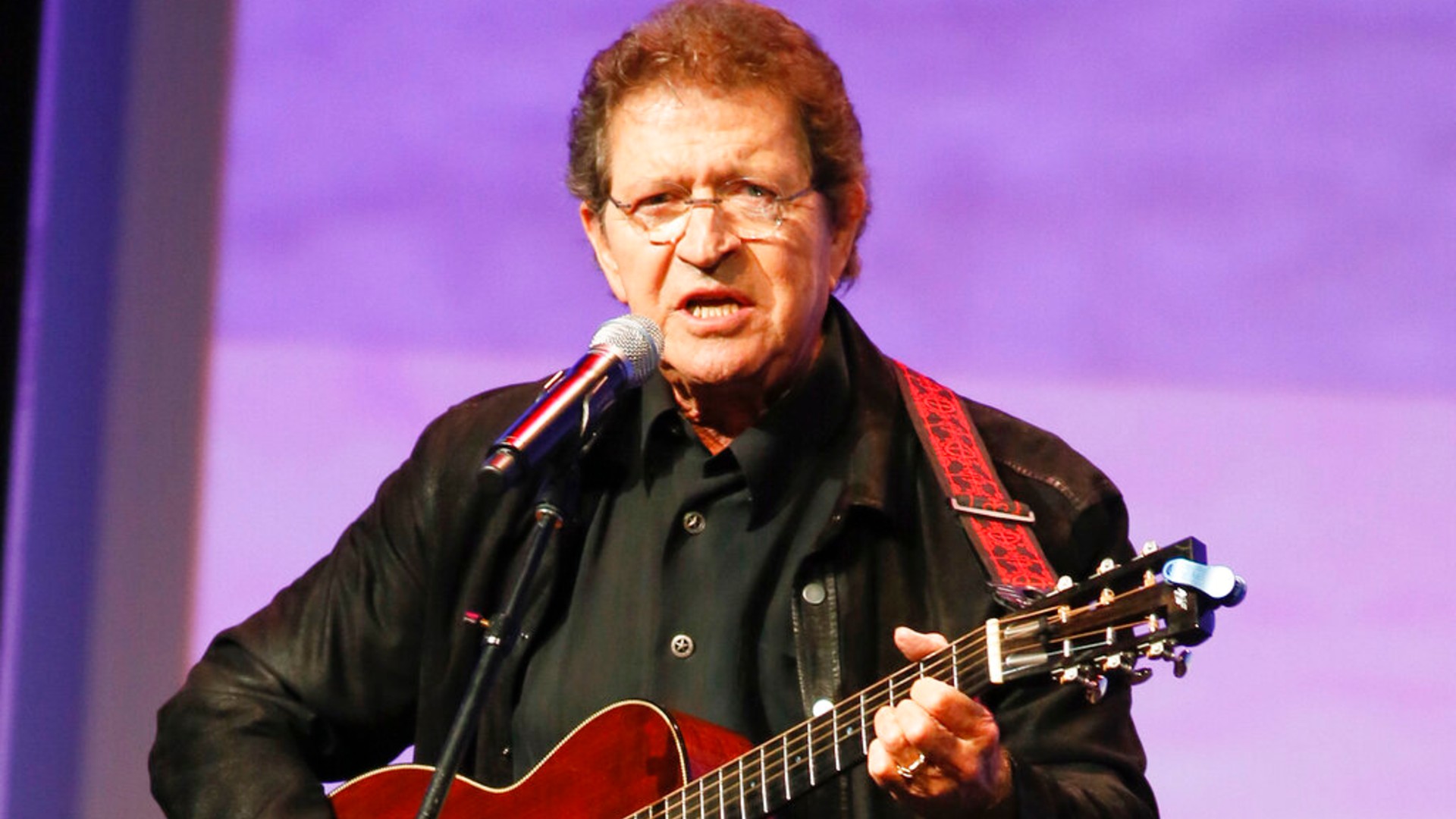 Musician Mac Davis performs at the Texas Film Awards in Austin, Texas on March 6, 2014. (Photo by Jack Plunkett/Invision/AP, File)