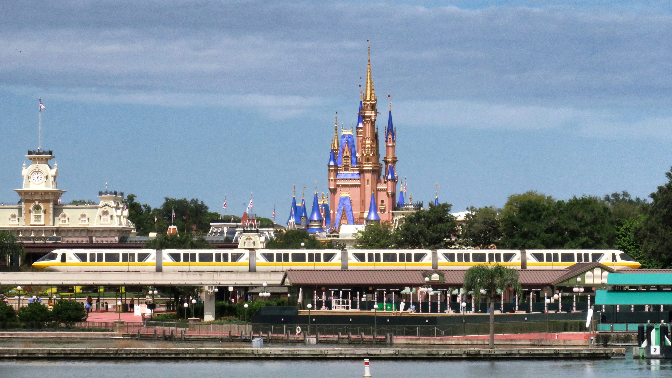 A view of Cinderella Castle from Seven Seas Lagoon in the Magic Kingdom at Walt Disney World, in Lake Buena Vista, Fla., Wednesday, Sept. 30, 2020. The Walt Disney Co. announced Tuesday that it is planning to lay off 28,000 workers in its theme parks division in California and Florida. The company has been squeezed by limits on attendance at its parks and other restrictions due to the pandemic. (Joe Burbank/Orlando Sentinel via AP)