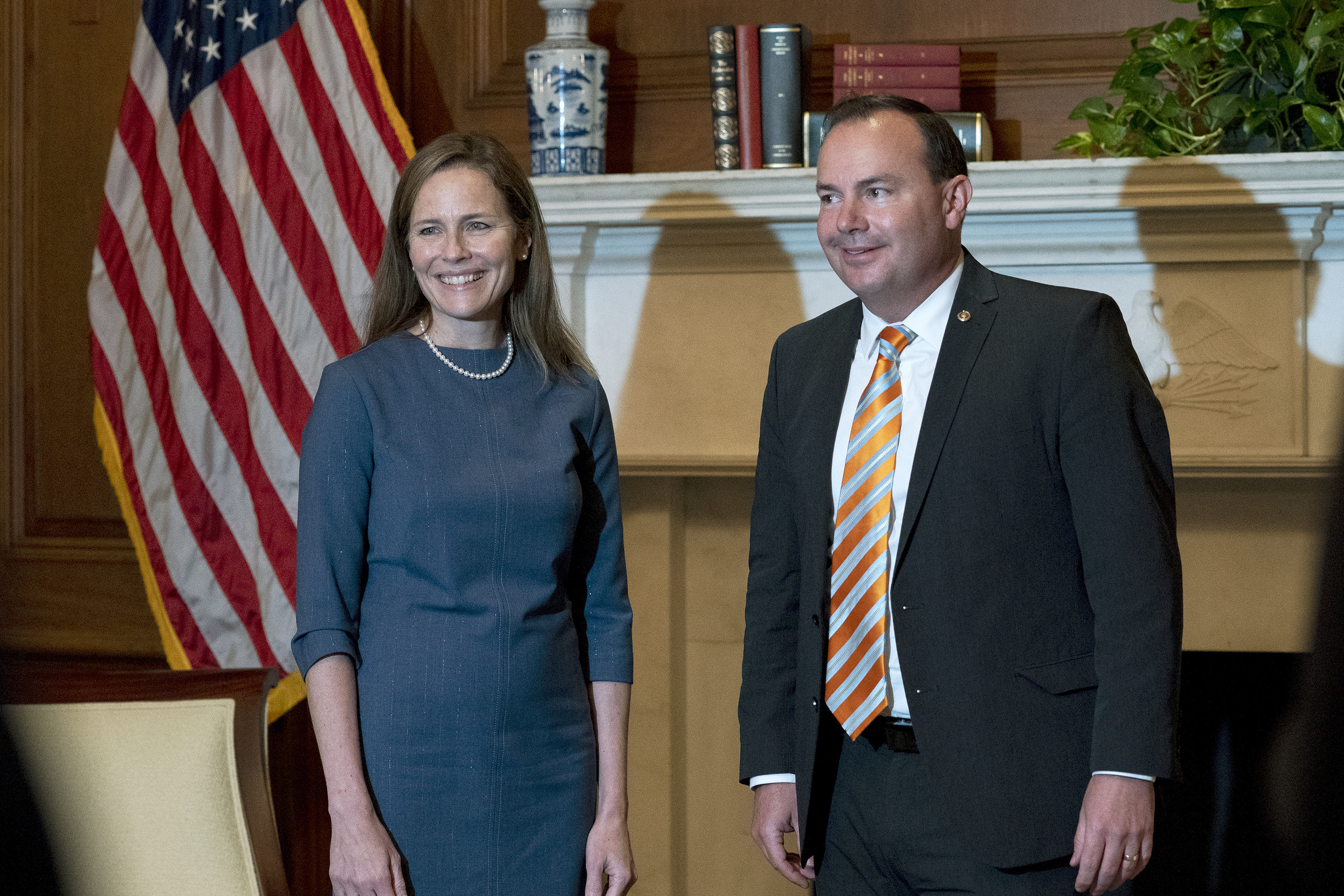 In this Sept. 29, 2020, photo, Judge Amy Coney Barrett, President Donald Trump's nominee to the Supreme Court, poses with Sen. Mike Lee, R-Utah, both without masks, at the Capitol in Washington. (Stefani Reynolds/Pool via AP, File)