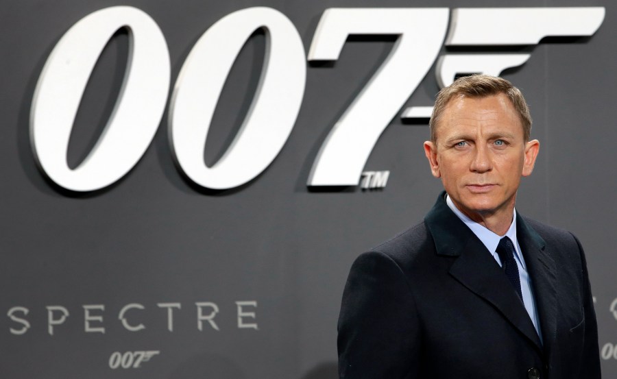 This is a Oct. 28, 2015, file photo of actor Daniel Craig poses for the media as he arrives for the German premiere of the James Bond movie "Spectre" in Berlin, Germany. (AP Photo/Michael Sohn, File)