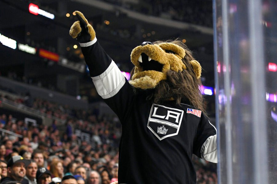 In this Sept. 30, 2017, file photo, Los Angeles Kings mascot Bailey entertains the crowd during a preseason NHL hockey game against the Anaheim Ducks in Los Angeles. (AP Photo/Michael Owen Baker, File)