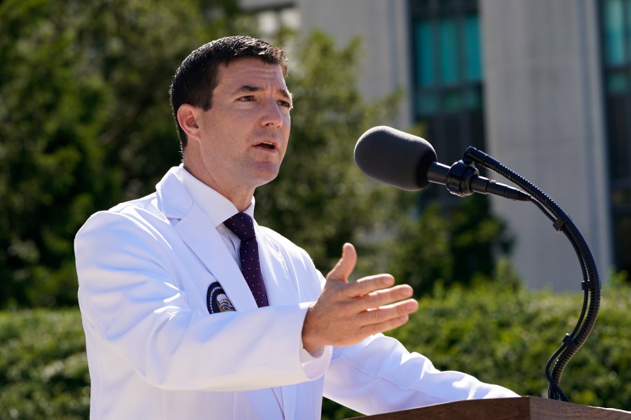 Dr. Sean Conley, physician to President Donald Trump, briefs reporters at Walter Reed National Military Medical Center in Bethesda, Md., Saturday, Oct. 3, 2020. Trump was admitted to the hospital after contracting the coronavirus. (AP Photo/Susan Walsh)