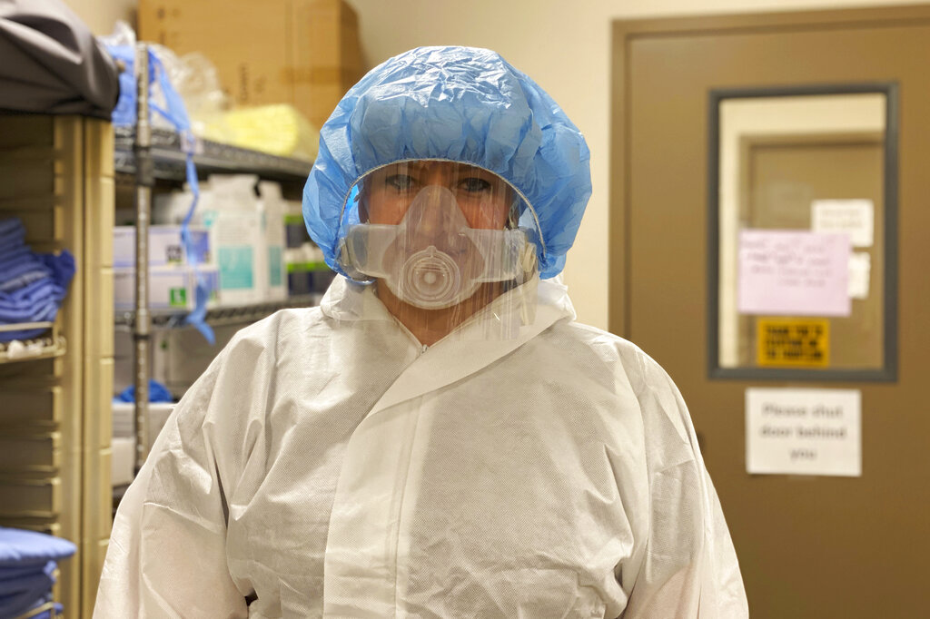 In this Sept. 21, 2020, photo provided by CoxHealth, nurse Amelia Montgomery poses for a photo at Cox South Hospital in Springfield, Mo. (Kaitlyn McConnell/CoxHealth via AP)