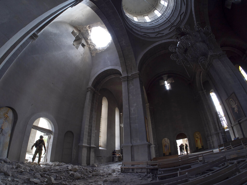 A hole made by shell in the roof of the Holy Savior Cathedral during a military conflict, in Shushi, outside Stepanakert, self-proclaimed Republic of Nagorno-Karabakh on Oct. 8, 2020. (AP Photo)