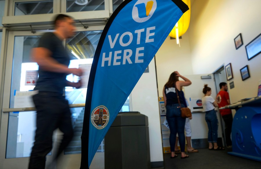 Voters wait in line to cast their ballot on the Super Tuesday, March 3, 2020, at a voting center in El Segundo. (AP Photo/Ringo H.W. Chiu, File)