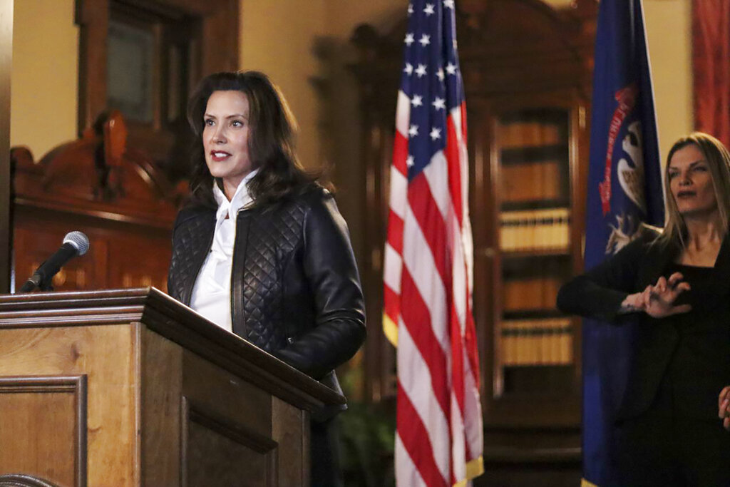 In a photo provided by the Michigan Office of the Governor, Michigan Gov. Gretchen Whitmer addresses the state during a speech in Lansing, Mich., Thursday, Oct. 8, 2020. (Michigan Office of the Governor via AP)