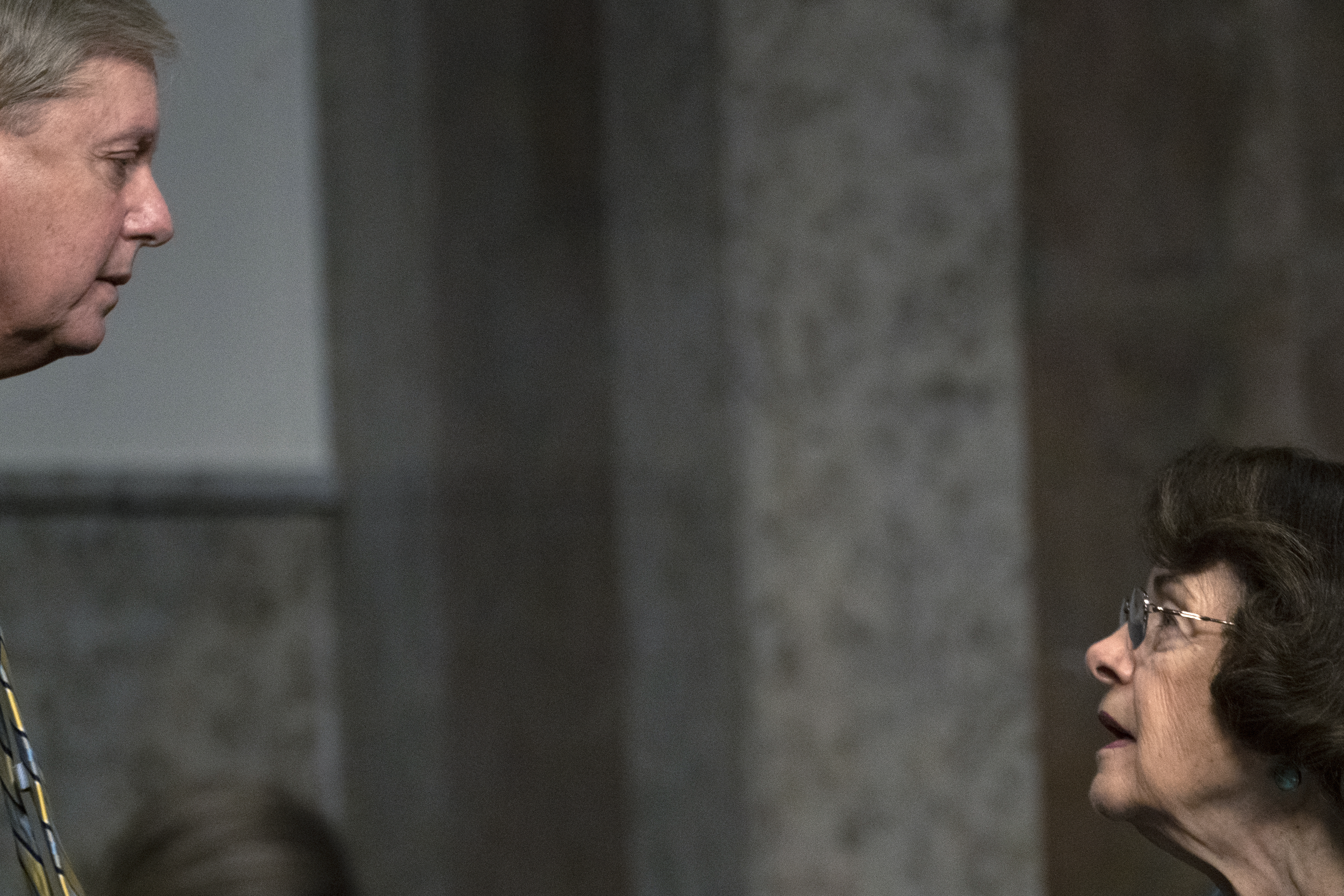 In this Aug. 5, 2020, file photo Senate Judiciary Committee chairman Sen. Lindsey Graham, R-S.C., left, speaks with ranking member Sen. Dianne Feinstein, D-Calif., during a Senate Judiciary Committee oversight hearing on Capitol Hill in Washington. (AP Photo/Carolyn Kaster, Pool, File)