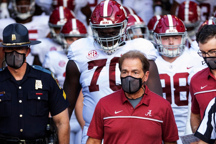 Alabama coach Nick Saban leads his team to the field before an NCAA college football game against Missouri in Columbia, Missouri, on Sept. 26, 2020. (L.G. Patterson / Associated Press)