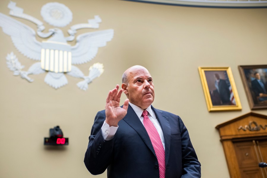 In this Monday, Aug. 24, 2020, file photo, Postmaster General Louis DeJoy is sworn in before testifying during a House Oversight and Reform Committee hearing on the Postal Service on Capitol Hill in Washington. (Tom Williams/AP)