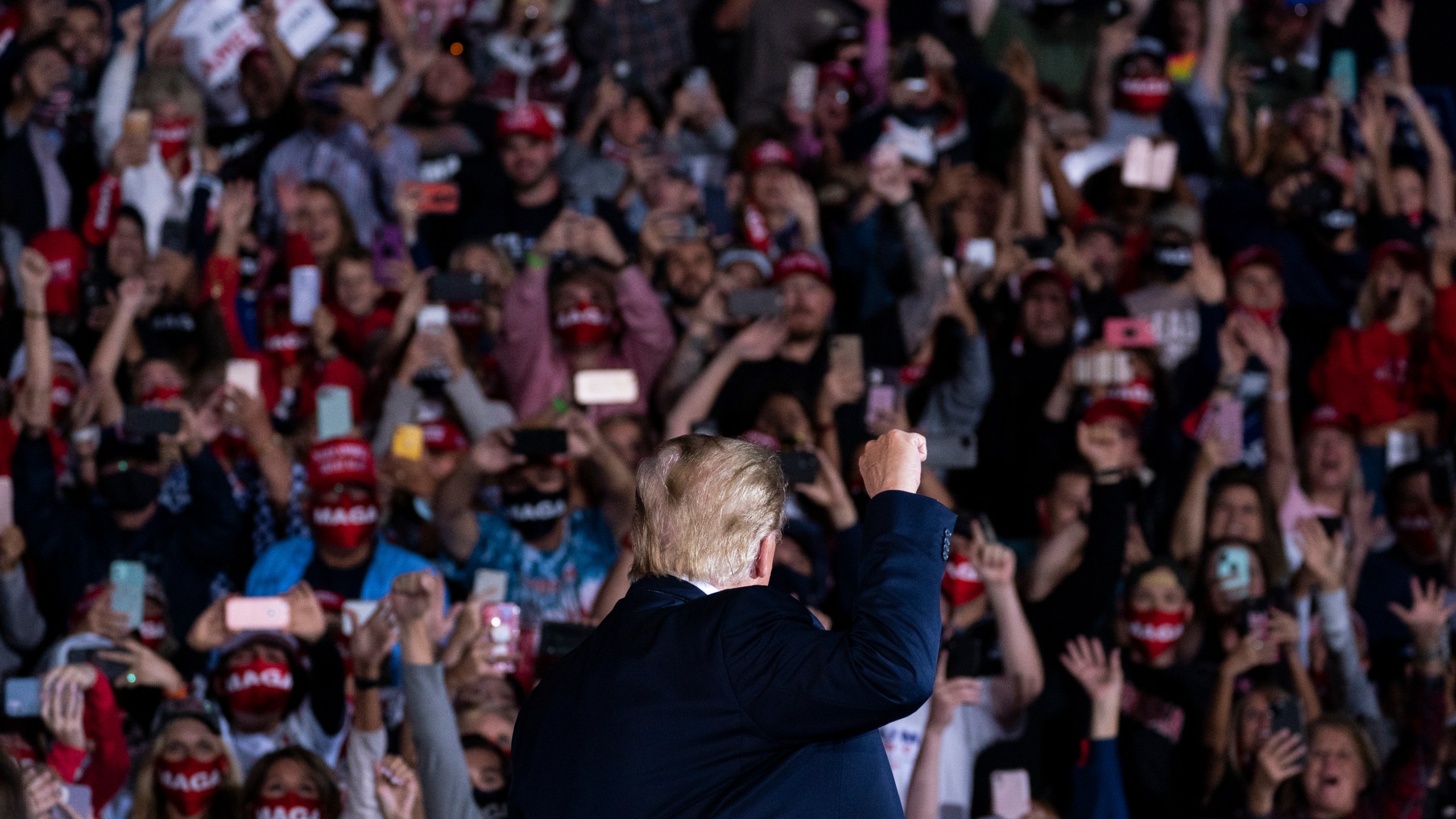 Donald Trump arrives to speak to a campaign rally at Middle Georgia Regional Airport, Friday, Oct. 16, 2020, in Macon, Ga. (AP Photo/Evan Vucci)