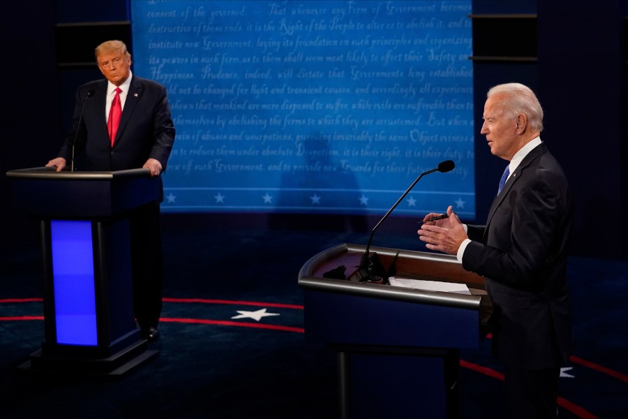 Democratic presidential candidate former Vice President Joe Biden answers a question as President Donald Trump listens during the second and final presidential debate Oct. 22, 2020, at Belmont University in Nashville, Tennessee. (Morry Gash / Associated Press)