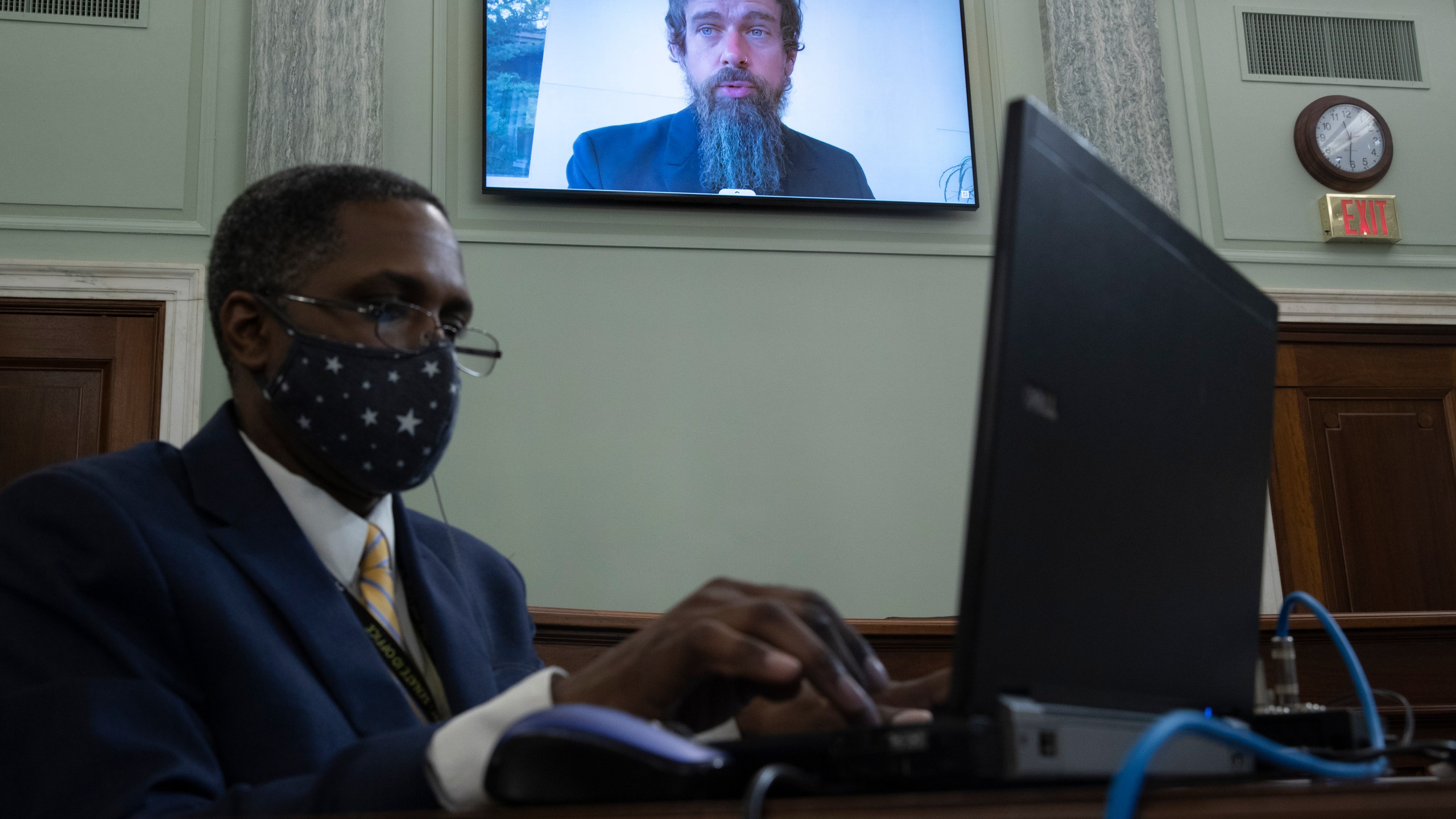 Twitter CEO Jack Dorsey appears on a screen as he speaks remotely during a hearing before the Senate Commerce Committee on Oct. 28, 2020. (Michael Reynolds/Pool via Associated Press)