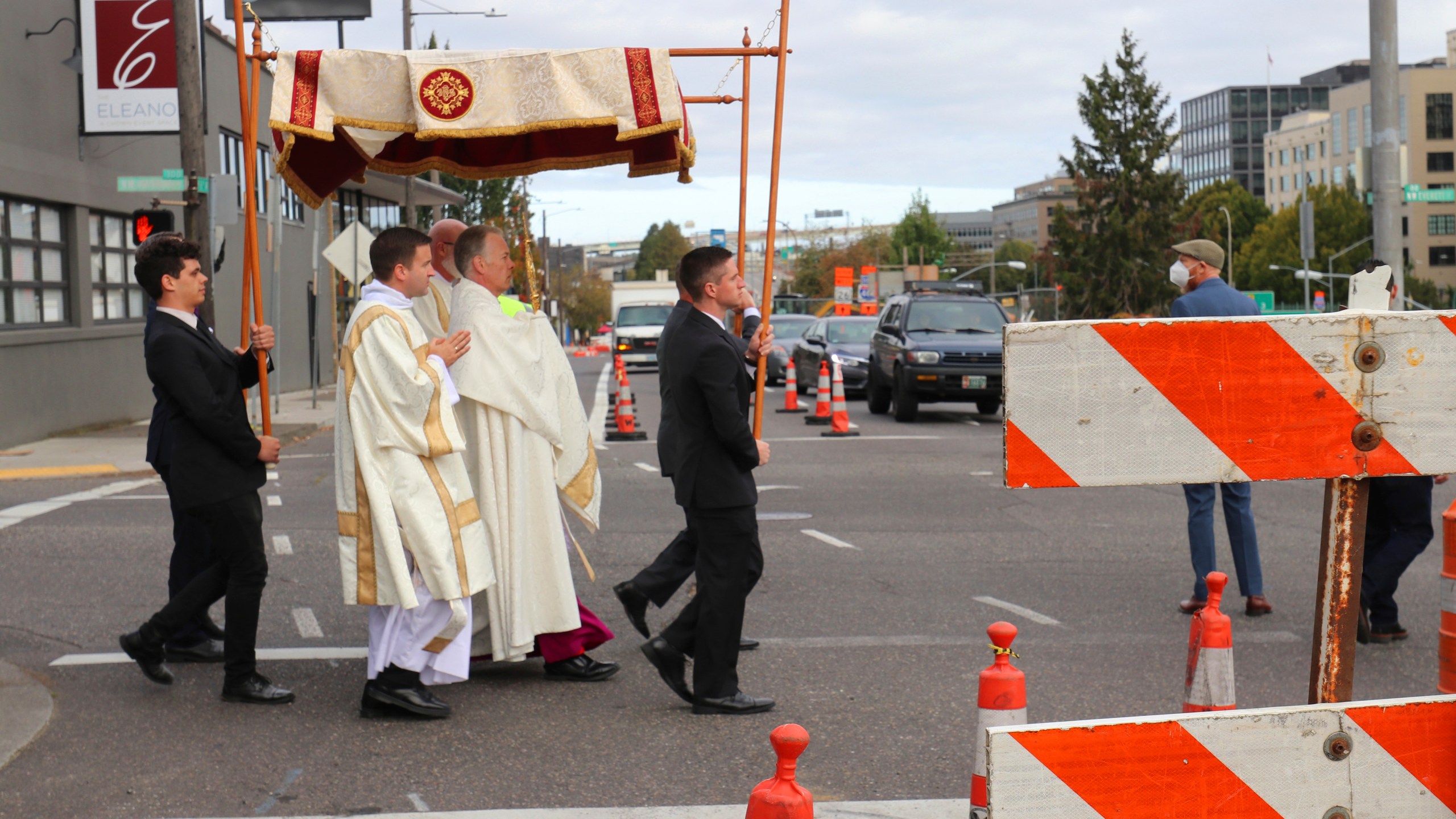 Archbishop Alexander Sample carries the Eucharist into downtown Portland, Ore., for an exorcism and rosary to bring peace and justice to the city on Oct. 17, 2020. (Ed Langlois/Catholic Sentinel via AP)