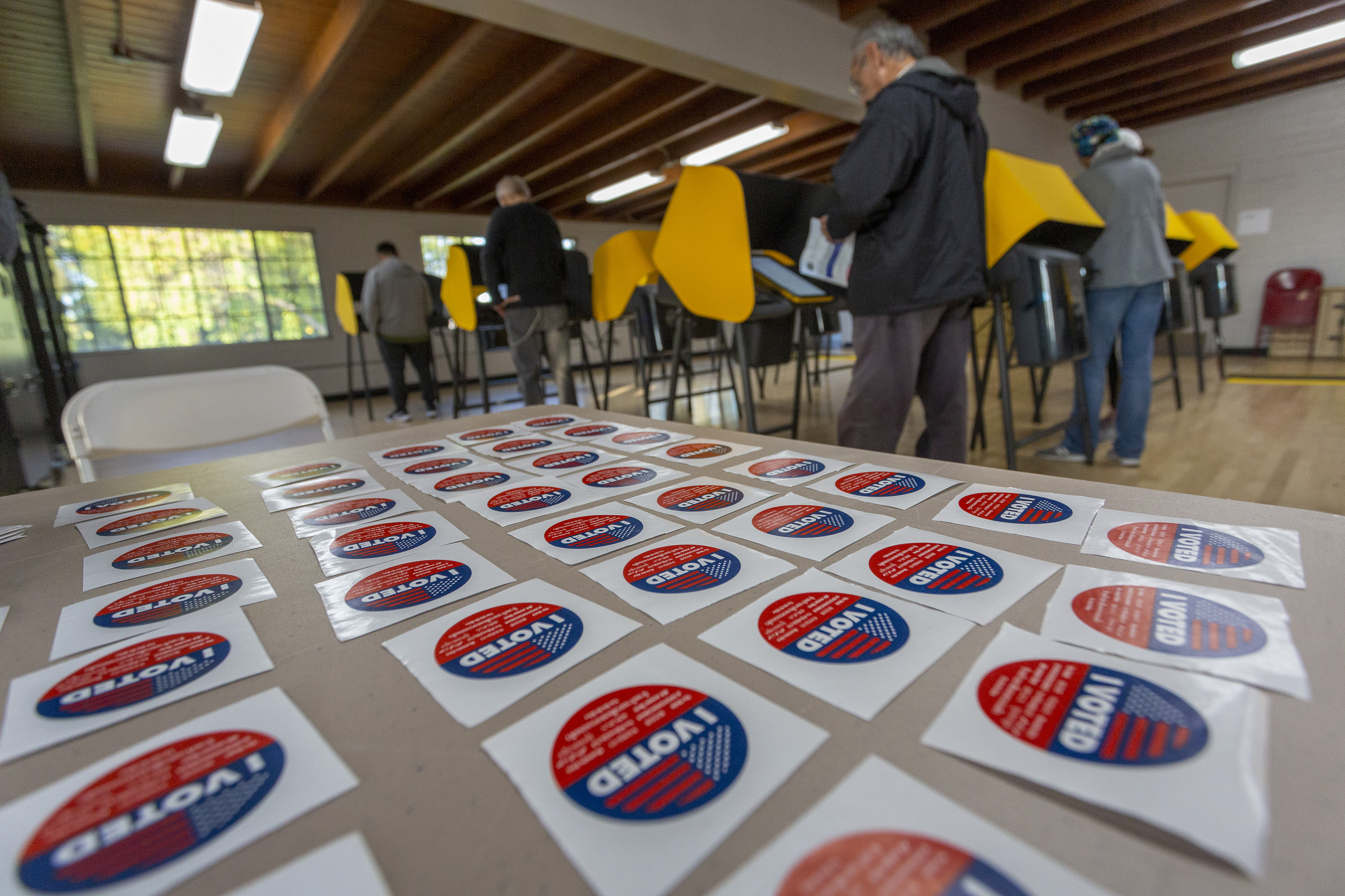 Voters cast their ballots at a voting center at Granada Park on March 3, 2020, in Alhambra. (David McNew/Getty Images)