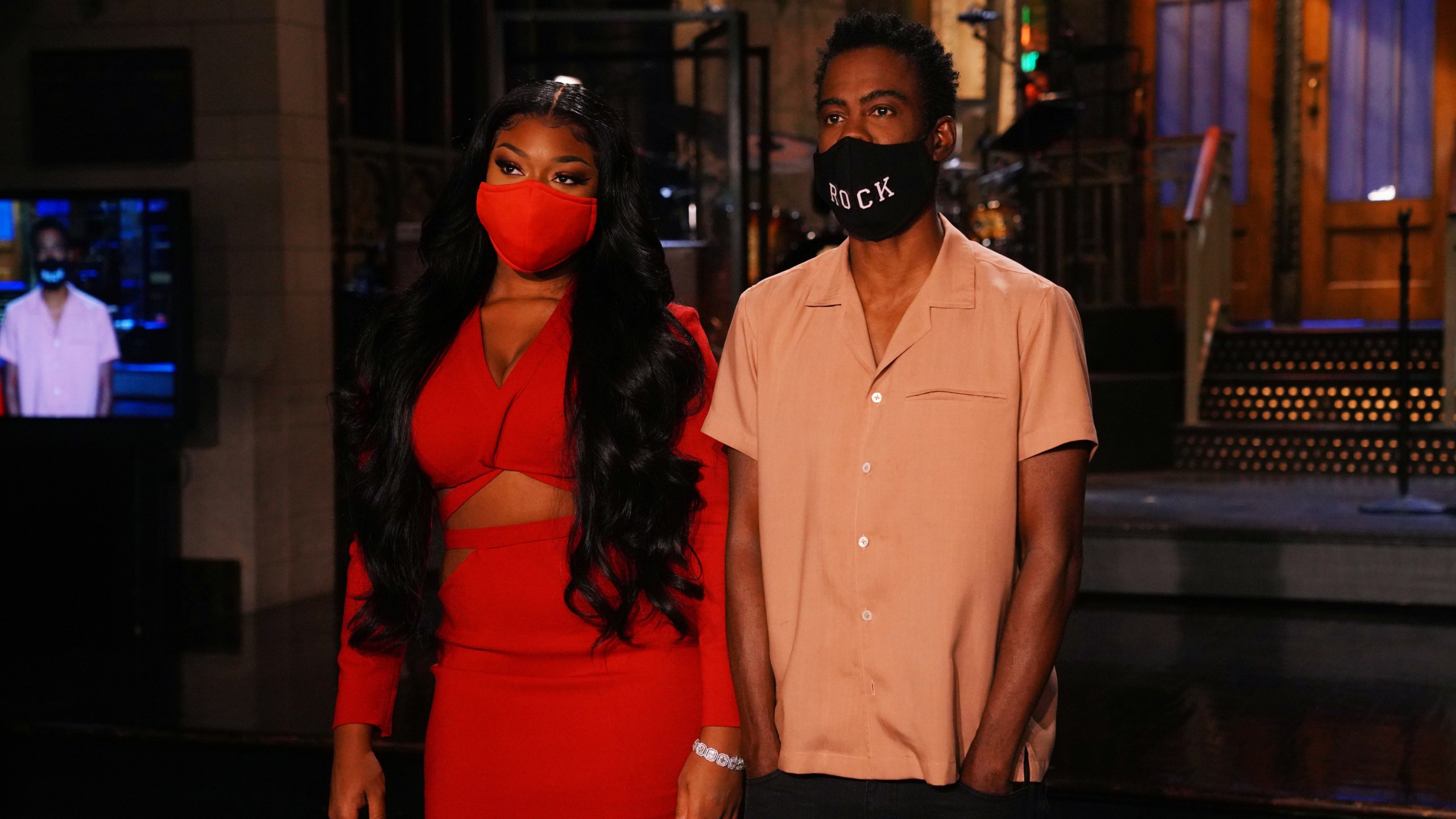 Musical guest Megan Thee Stallion and host Chris Rock appears in a promo for "Saturday Night Live" in October 2020. (Rosalind O'Connor/NBC/NBCU Photo Bank via Getty Images)