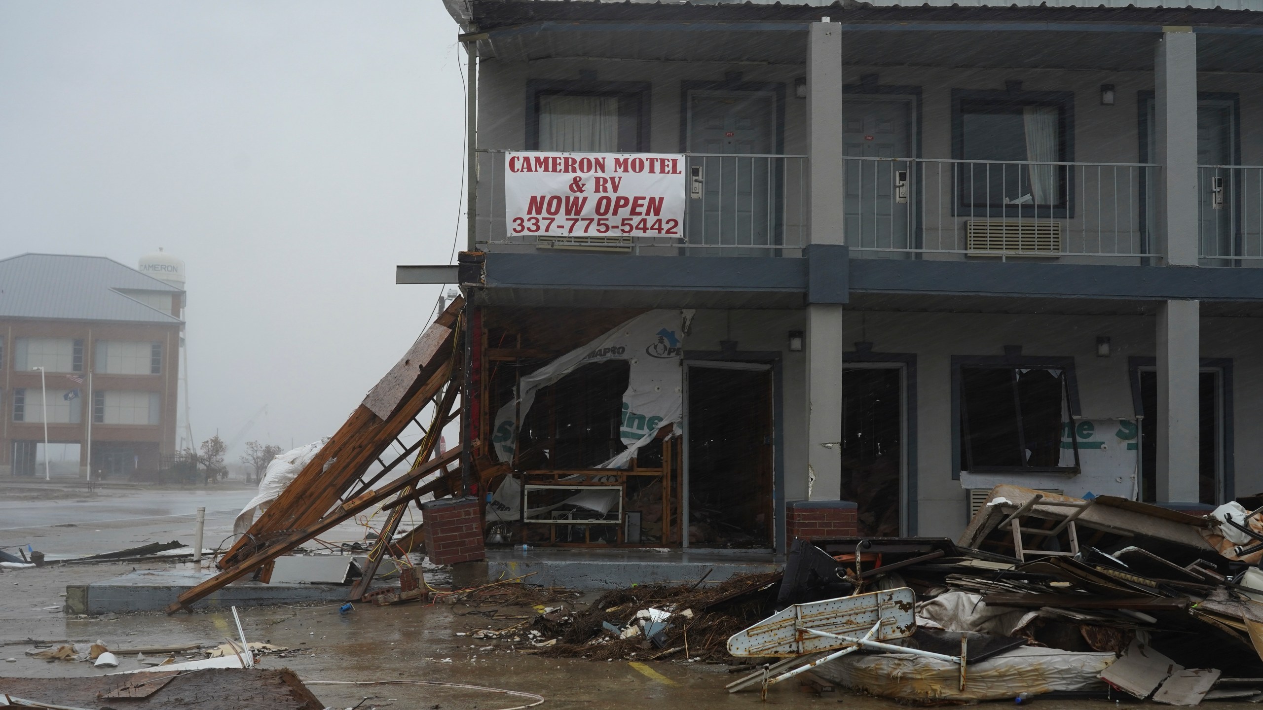 A pile of debris collected after Hurricane Laura remains in front of Cameron Motel as Hurricane Delta approaches on Oct. 9, 2020, in Cameron, Louisiana. (Go Nakamura / Getty Images)