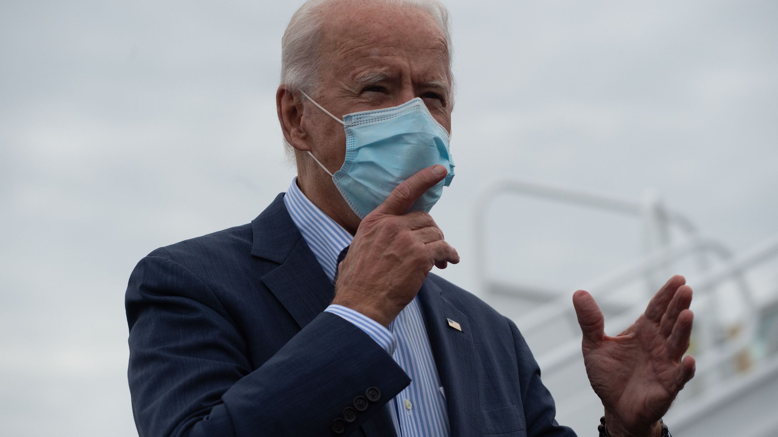 Democratic presidential candidate Joe Biden speaks to the press as he arrives at New Castle Airport in Wilmington, Delaware, on Oct. 10, 2020. (ROBERTO SCHMIDT/AFP via Getty Images)