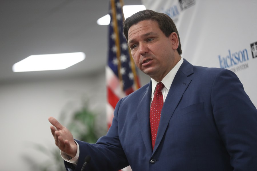 Florida Gov. Ron DeSantis speaks at a new conference on the surge in coronavirus cases in the state held at the Jackson Memorial Hospital on July 13, 2020, in Miami, Fla. The day before, Florida reported 15,300 new confirmed cases, topping the previous U.S. record for the largest daily increase in COVID-19 infections. (Joe Raedle/Getty Images)