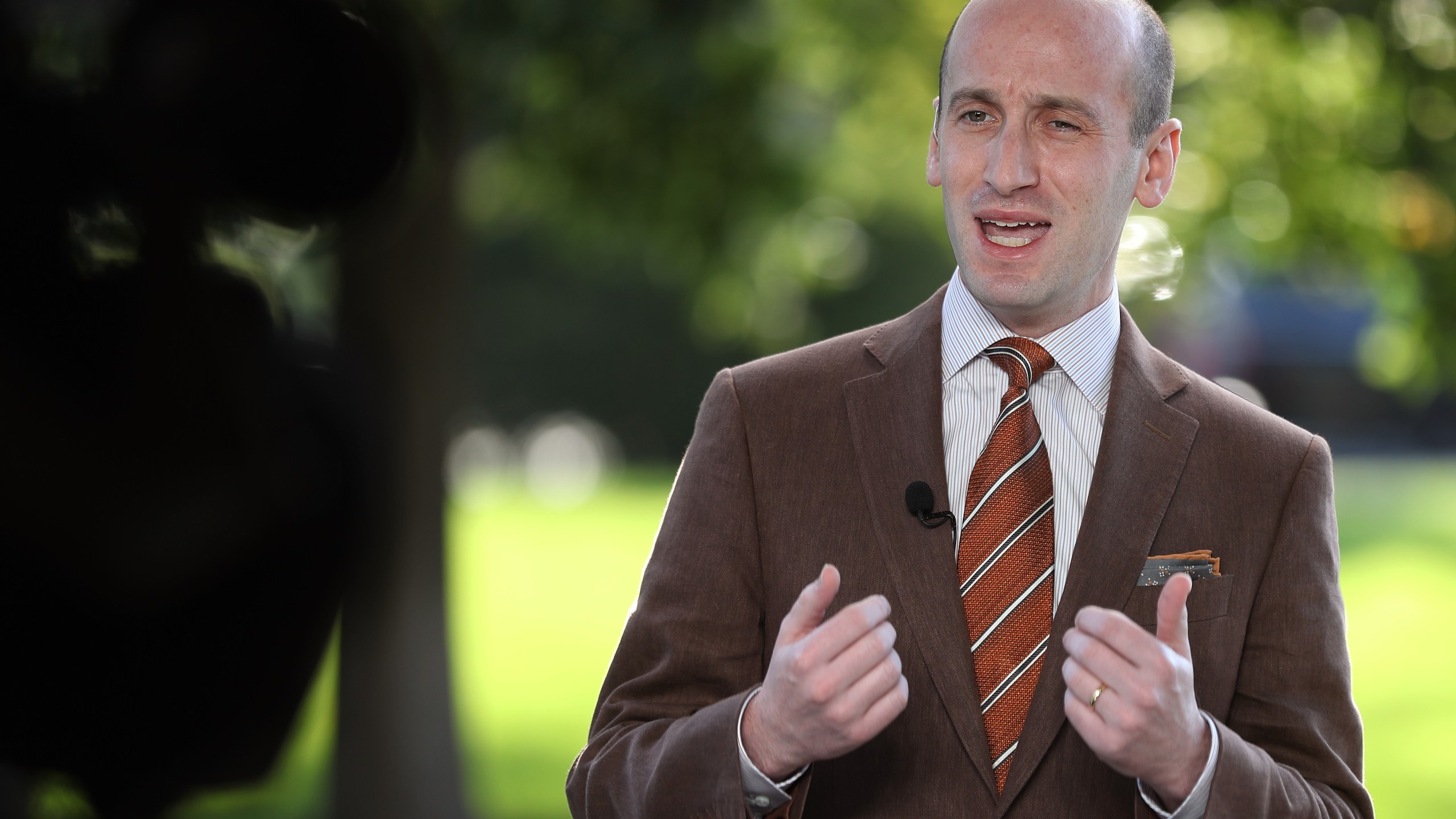 White House adviser Stephen Miller is interviewed on Fox News outside the West Wing on Aug. 20, 2020. (Chip Somodevilla / Getty Images)