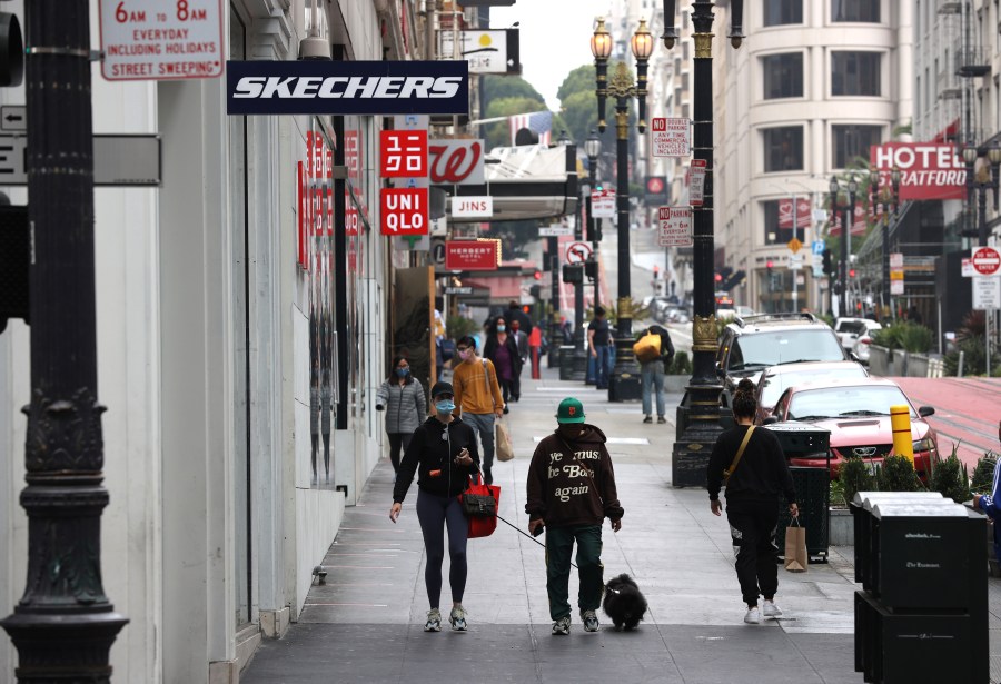 People walk through San Francisco's Union Square shopping district on Sept. 3, 2020. (Justin Sullivan/Getty Images)