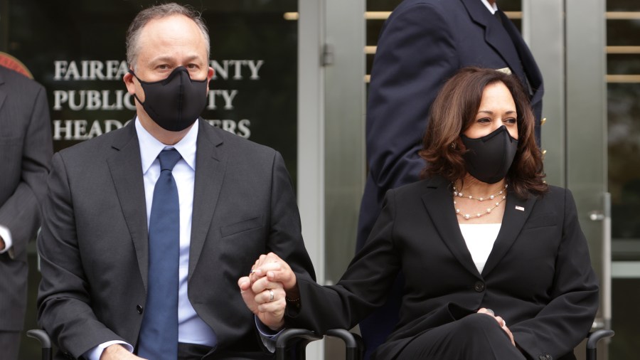 Democratic U.S. Vice Presidential nominee Sen. Kamala Harris and her husband Douglas Emhoff hold hands during a Fairfax 9/11 Remembrance Ceremony at Fairfax County Public Safety Headquarters on Sept. 11, 2020 in Fairfax, Virginia. (Alex Wong/Getty Images)