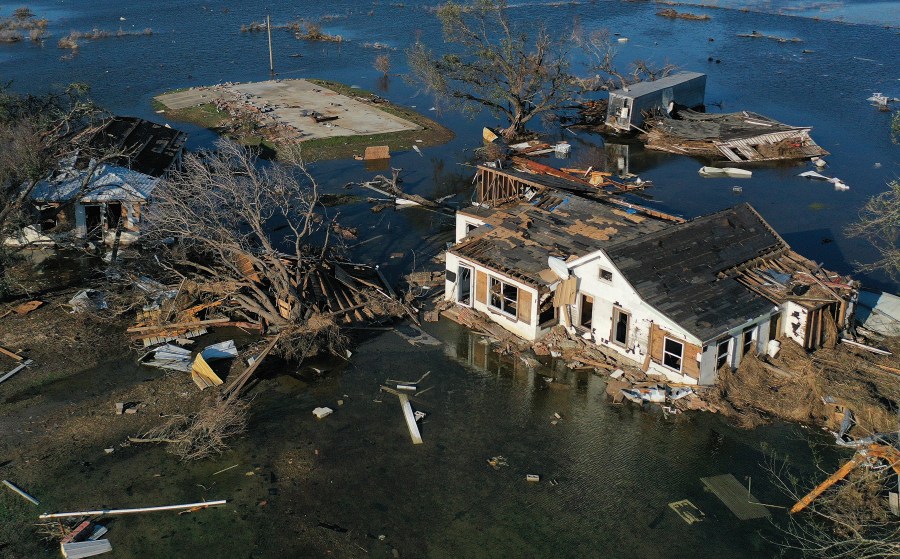 An aerial view of floodwaters from Hurricane Delta surrounding structures destroyed by Hurricane Laura on Oct. 10, 2020, in Creole, Louisiana. Hurricane Delta made landfall near Creole as a Category 2 storm in Louisiana, initially leaving some 300,000 customers without power. (Mario Tama/Getty Images)