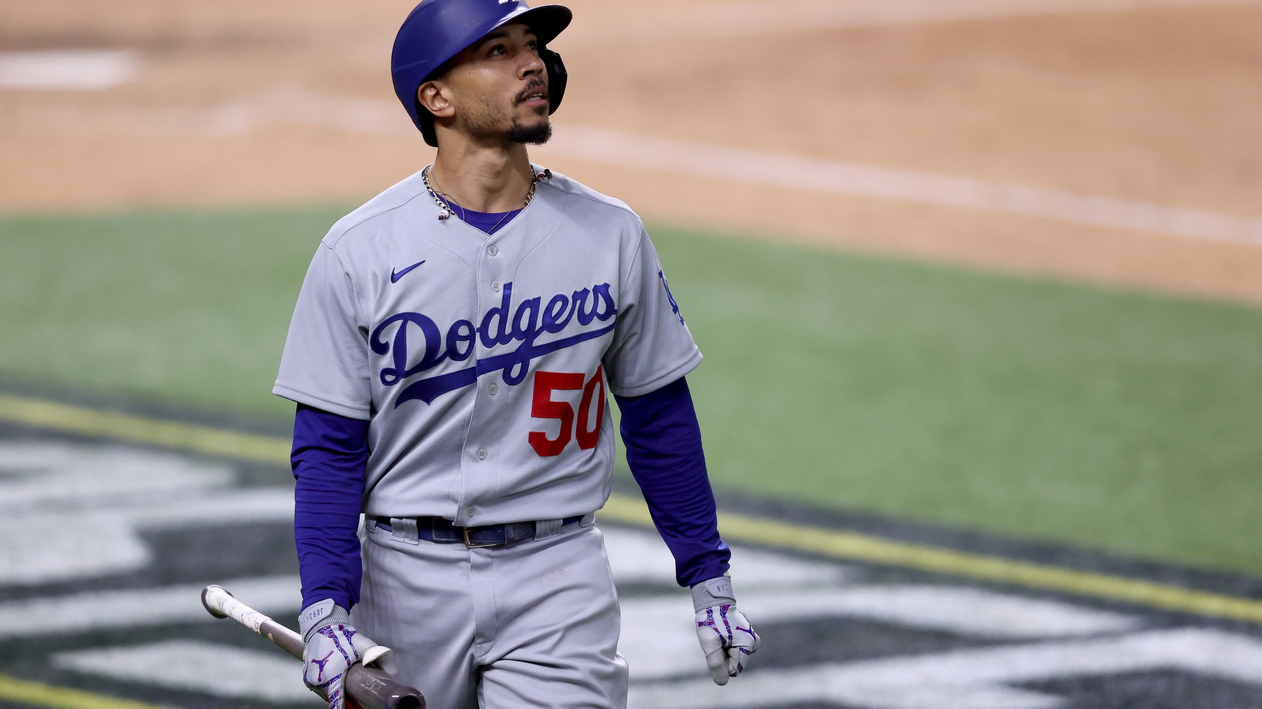 Mookie Betts of the Los Angeles Dodgers reacts after striking out against the Atlanta Braves during the eighth inning in Game Four of the National League Championship Series on Oct. 15, 2020, in Arlington, Texas. (Tom Pennington / Getty Images)