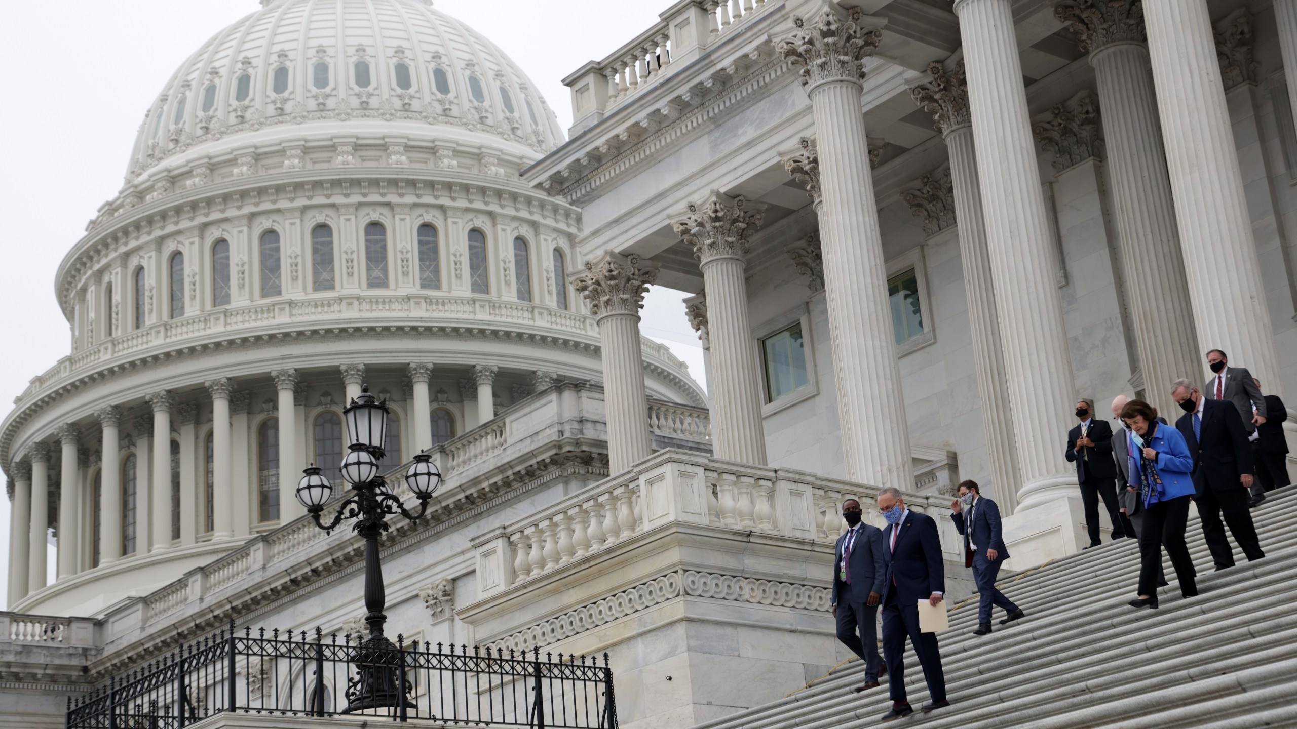 Democratic members of U.S. Senate Judiciary Committee walk down the east front steps of the U.S. Capitol for a news conference on Oct. 22, 2020 in Washington, DC. (Alex Wong/Getty Images)