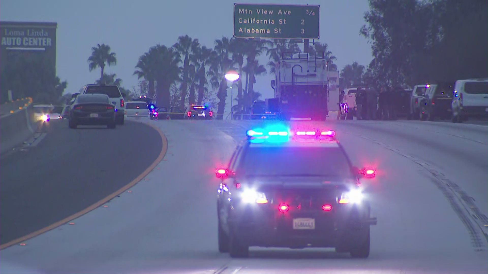 Authorities investigate the deadly Fontana police shooting of a suspect on the eastbound 10 Freeway in the Loma Linda area on Oct. 24, 2020. (KTLA)