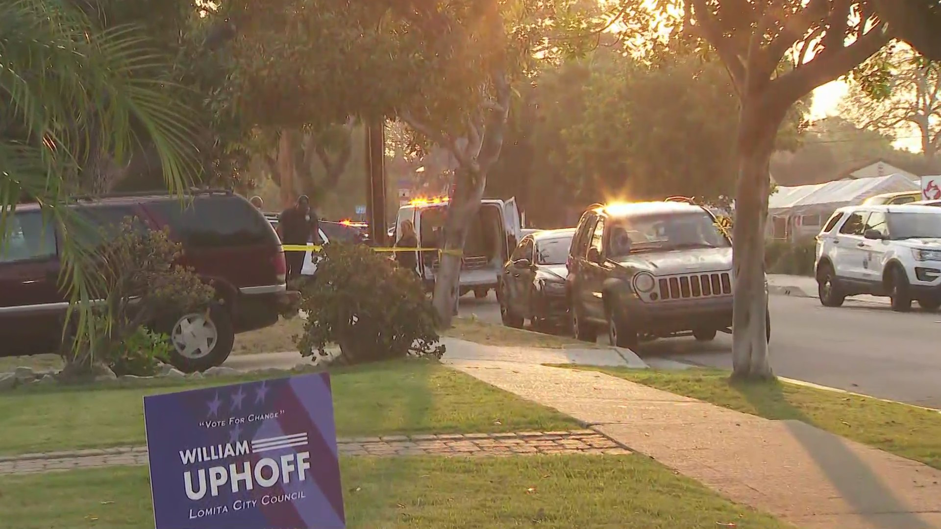 Authorities investigate the deadly shooting of two people in the 2100 block of 255th Street in Lomita on Oct. 4, 2020. (KTLA)