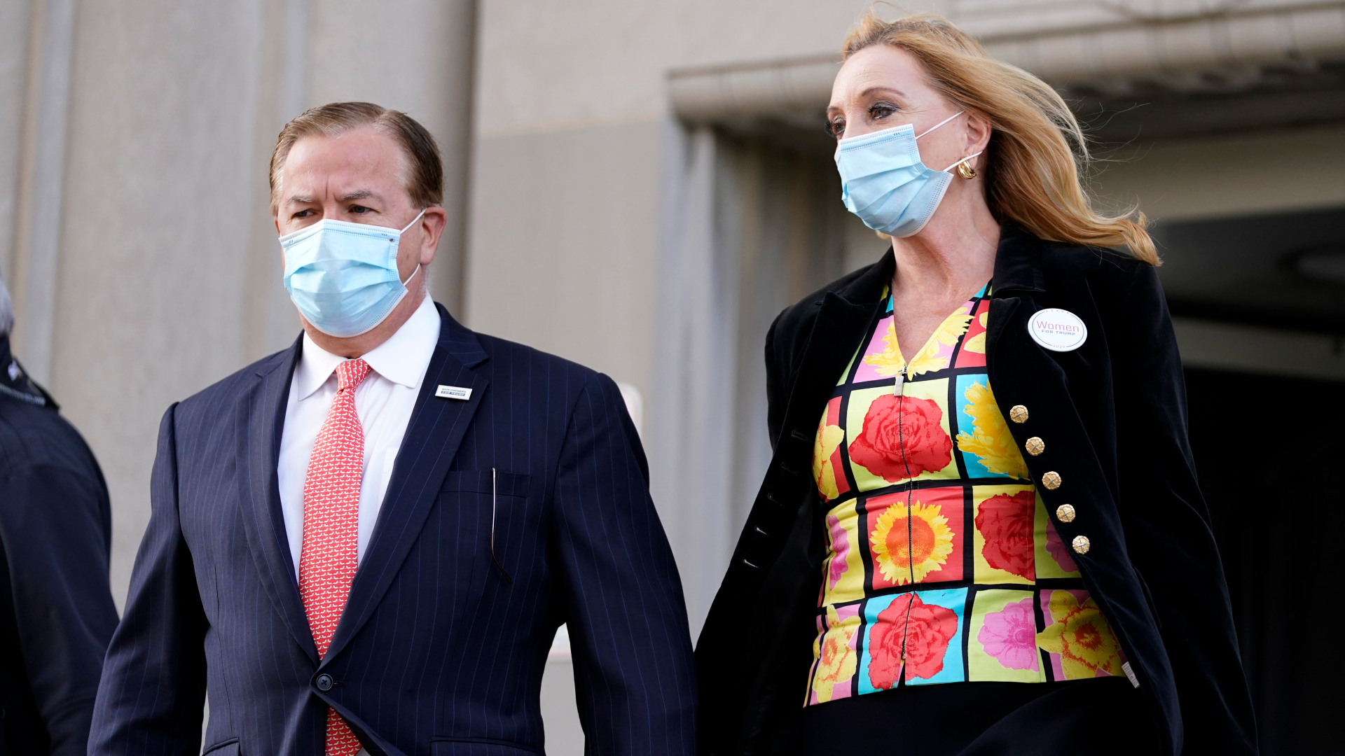 Mark and Patricia McCloskey leave following a court hearing in St. Louis on Oct. 14, 2020. (Jeff Roberson / Associated Press)