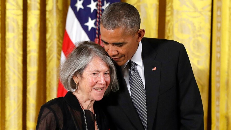 n this Thursday, Sept. 22, 2016 file photo, President Barack Obama embraces poet Louise Gluck before awarding her the 2015 National Humanities Medal during a ceremony in the East Room of the White House, in Washington. (AP Photo/Carolyn Kaster, File)