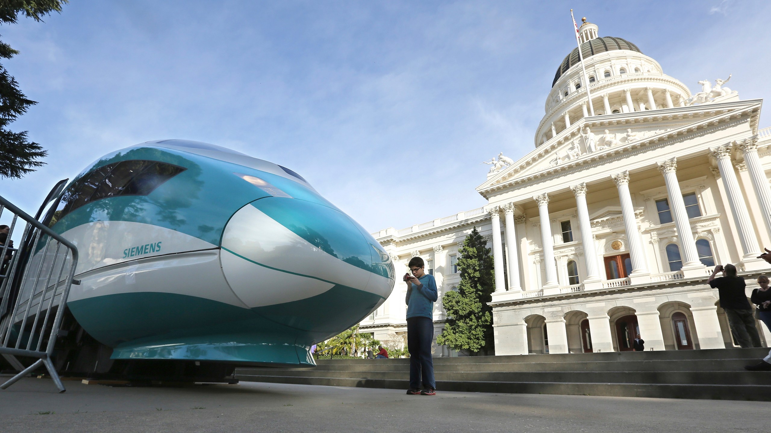 In this Feb. 26, 2015, file photo, a full-scale mock-up of a high-speed train is displayed at the Capitol in Sacramento. (AP Photo/Rich Pedroncelli, file)