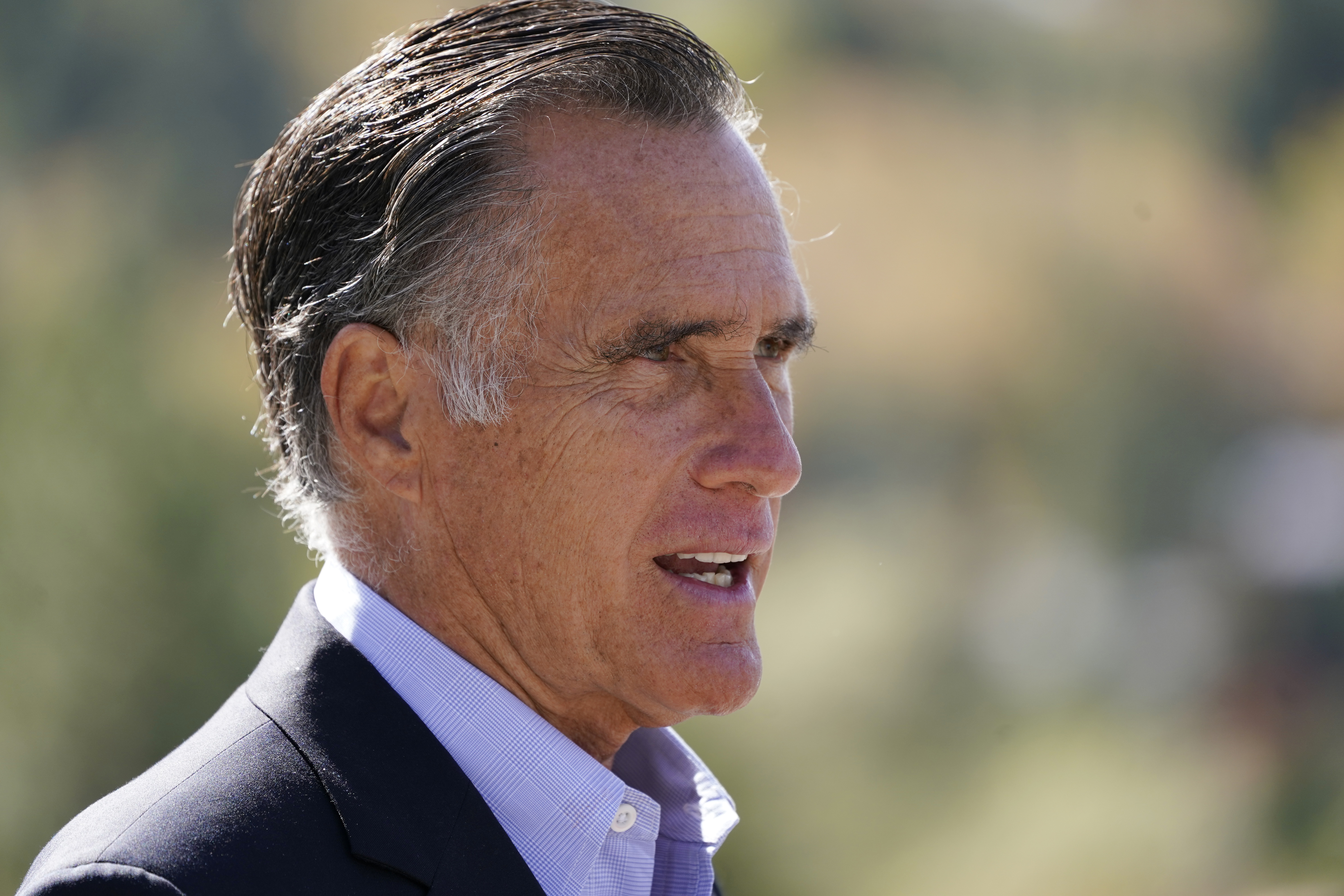 Sen. Mitt Romney, R-Utah, speaks during a news conference Thursday, Oct. 15, 2020, near Neffs Canyon, in Salt Lake City. (AP Photo/Rick Bowmer)