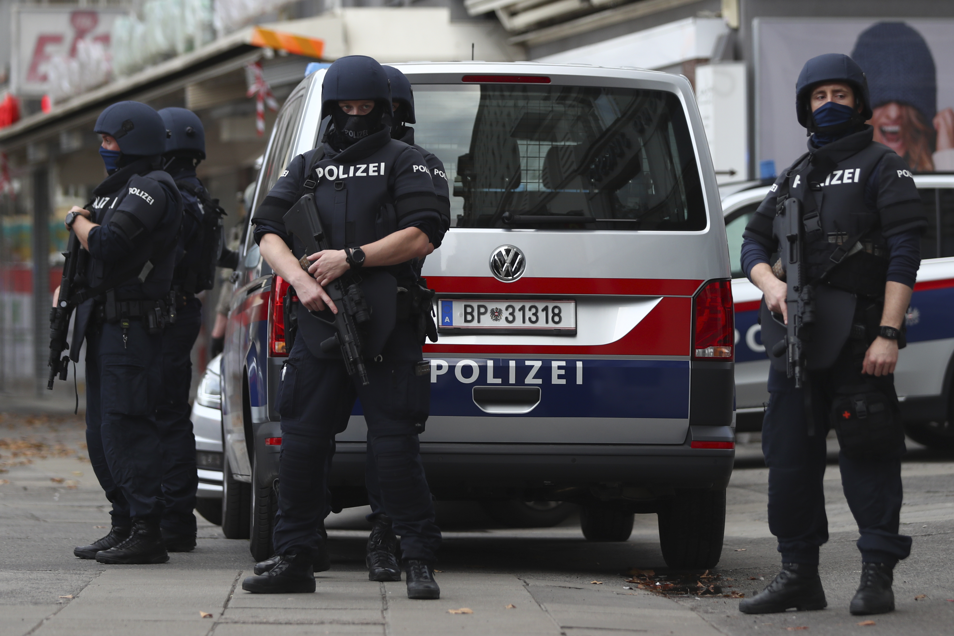 Police officers guard the scene in Vienna, Austria, Tuesday, Nov. 3, 2020. Police in the Austrian capital said several shots were fired shortly after 8 p.m. local time on Monday, Nov. 2, in a lively street in the city center of Vienna. (Matthias Schrader/AP Photo)