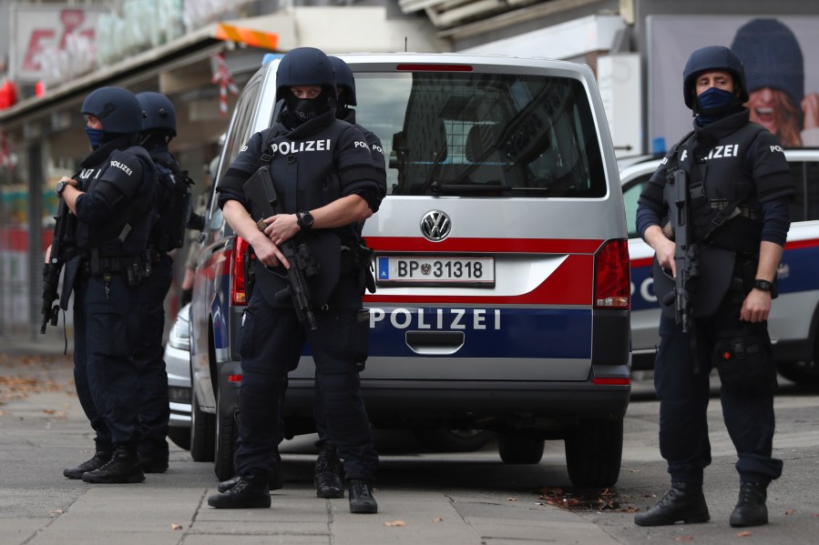 Police officers guard the scene in Vienna, Austria, Tuesday, Nov. 3, 2020. Police in the Austrian capital said several shots were fired shortly after 8 p.m. local time on Monday, Nov. 2, in a lively street in the city center of Vienna. (Matthias Schrader/AP Photo)