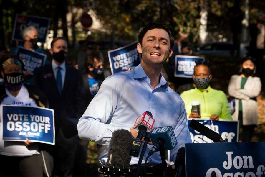 Georgia Democratic candidate for U.S. Senate Jon Ossoff speaks to the media as he rallies supporters for a run-off against Republican candidate Sen. David Perdue, as they meet in Grant Park, Friday, Nov. 6, 2020, in Atlanta. (John Amis/AP Photo)