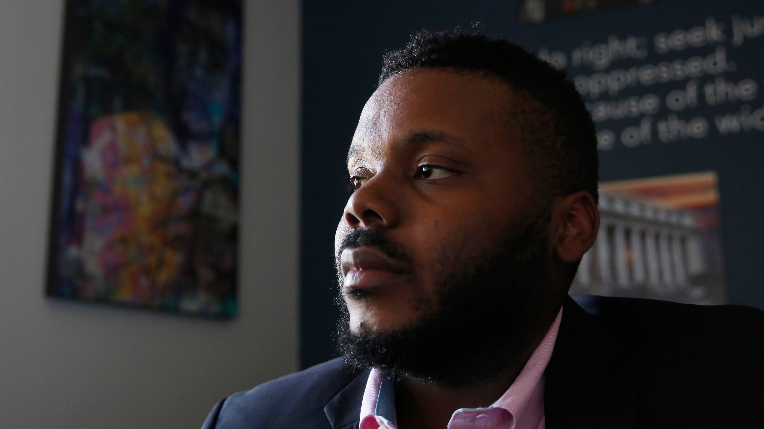 In this Aug. 14, 2019, file photo, Stockton Mayor Michael Tubbs talks during an interview in Stockton, Calif. Tubbs is one of the youngest mayors in the country and was the city’s first Black mayor. He garnered national attention with his universal basic income program that fights poverty by paying people $500 a month. But despite winning 70% of the vote, Tubbs is trailing a Republican challenger, putting him in danger of losing his seat. (AP Photo/Rich Pedroncelli, File)