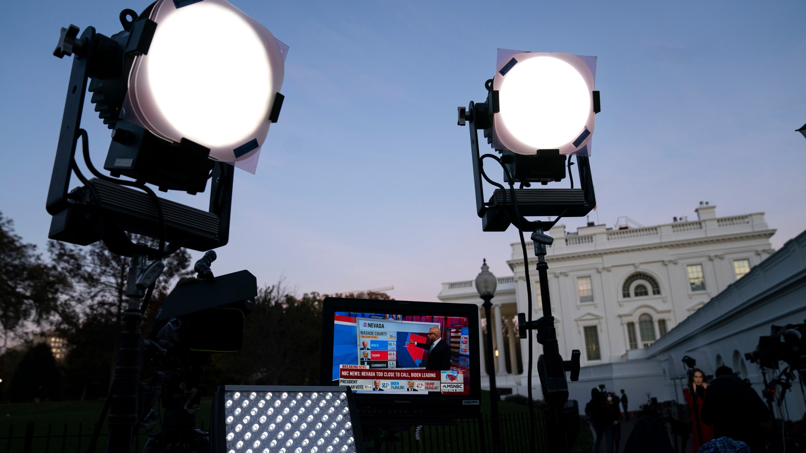 In this Nov. 6, 2020, file photo, media organizations set up outside the White House in Washington. (AP Photo/Evan Vucci, File)