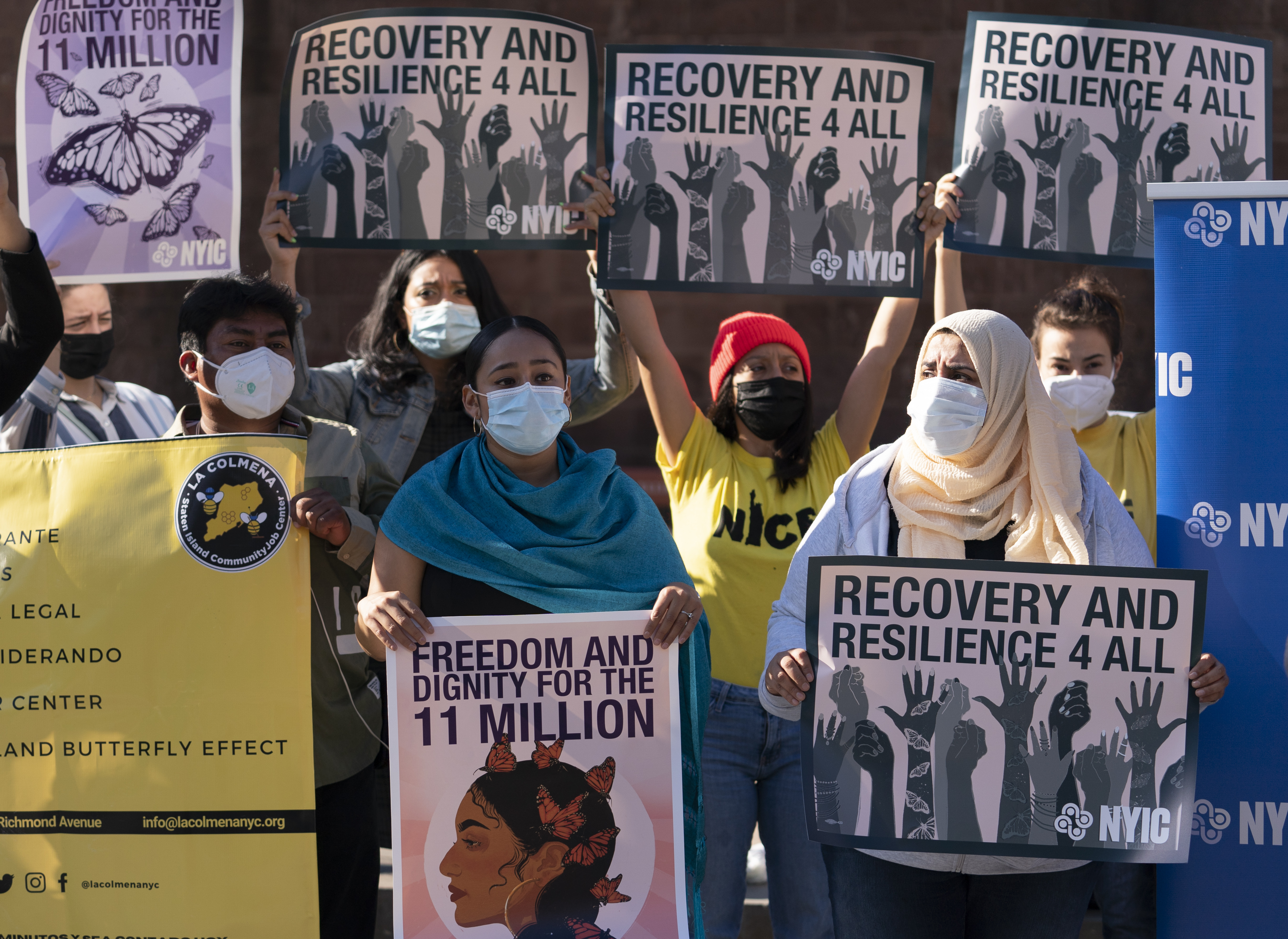 Demonstrators with the New York Immigration Coalition rally asking President-elect Joe Biden to prioritize immigration reform, Monday, Nov. 9, 2020, in New York. (AP Photo/Mark Lennihan)